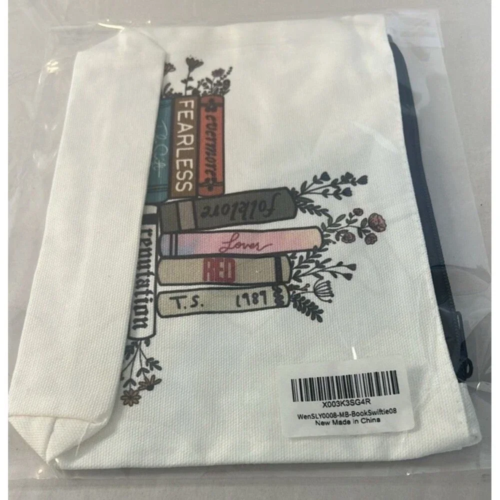 White and Black Cosmetic Bag with Books Design